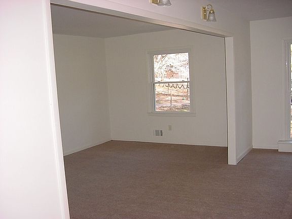 Add'l Area Makes this Family Room HUGE! Can be made to Large 4th BR!