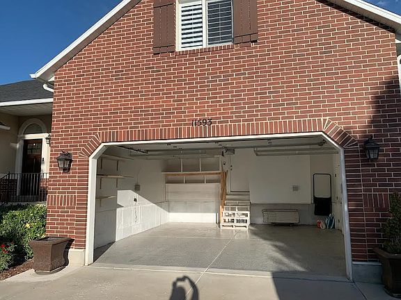 2 car garage with ceiling storage.
