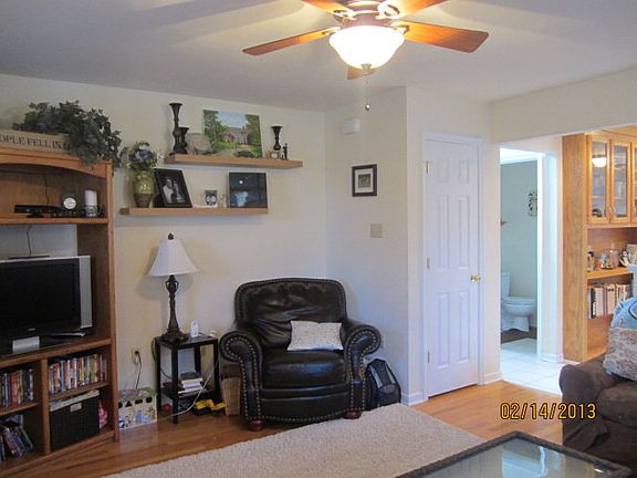 Family Room with view of kitchen and hallway.