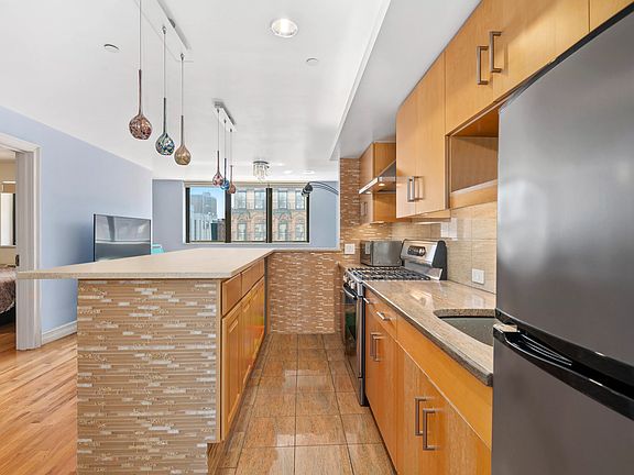 3rd image of 138 E Broadway #3A