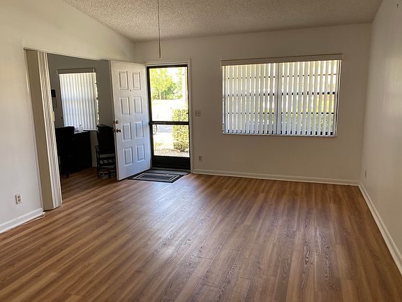 Home For Sale In VILLAGES OF WOODLAKE
