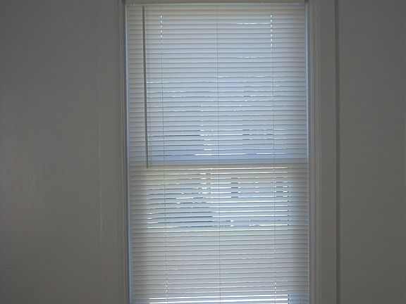 Cordless mini blinds in whole house.