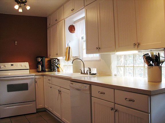 Updated kitchen with original glass block, under-cabinet lighting 