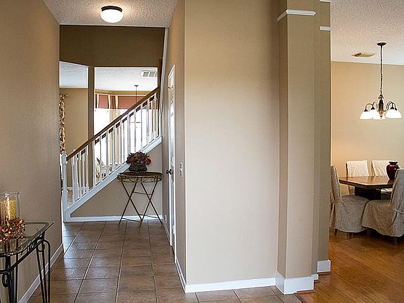 Entry way opens up to the dining/formal living area.