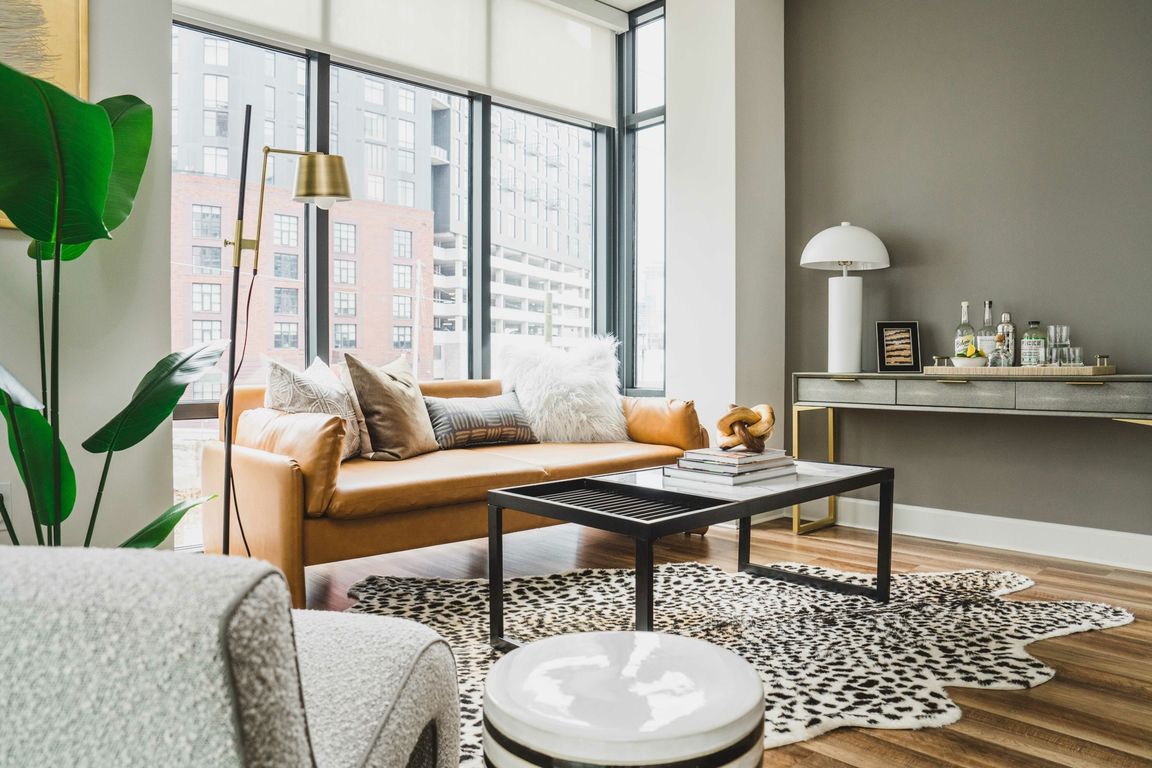 Oversized windows with roller shades