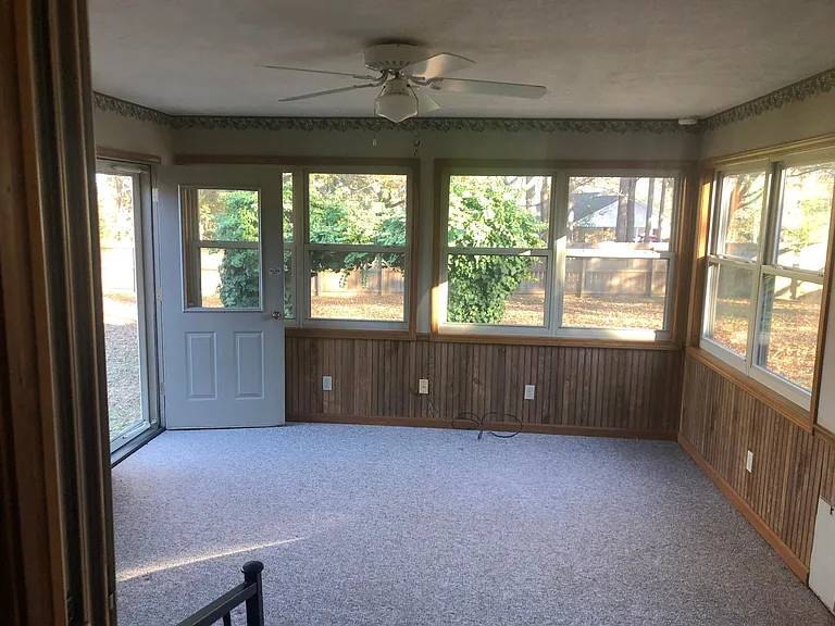 Sunroom was added a few years ago it has heat and air and doggie door! Approximately 200 ft._ great for a living room or dining room plenty of light new windows
