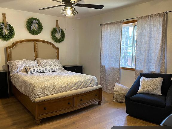 Master bedroom area with a queen bed