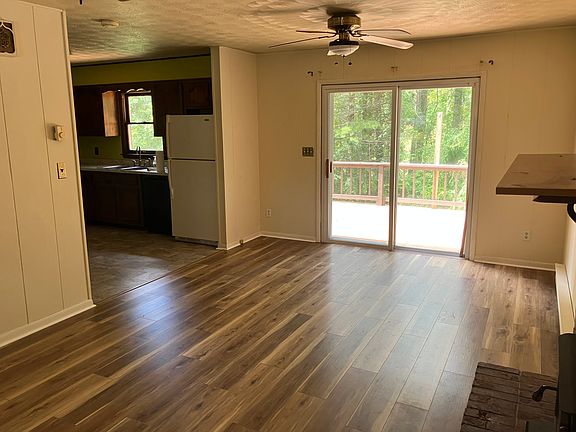 Living room with sliding doors onto back deck.