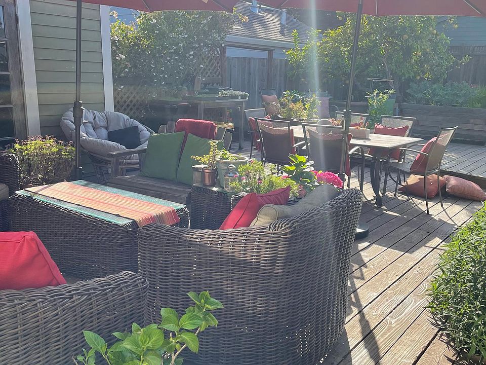 Out door dining, living space over looking fire pit, organic vegetable and fruit trees.