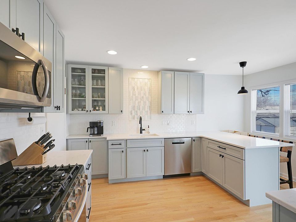 Quartz Countertops, Soft Close Maple Cabinets with pull out drawers
new appliances
pantry