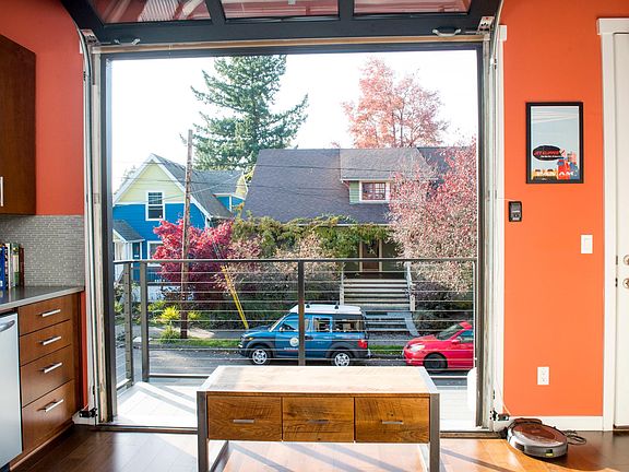 Garage door opens to the balcony
