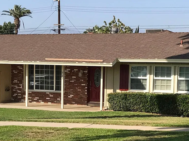 Front view. Master suite on right.