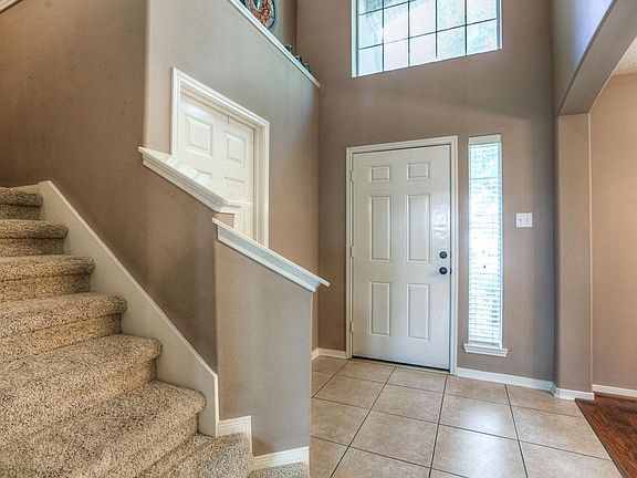 High volume ceilings in the entry and living areas.