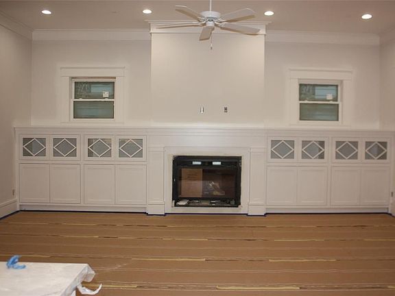 The diamond pattern from outside columns is carried through the living area and kitchen of the home.  Old style brick is planned