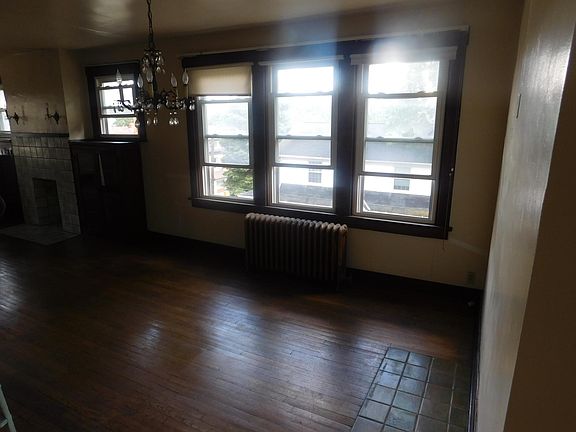 Dining room with beautiful hardwood floors and lots of natural light.