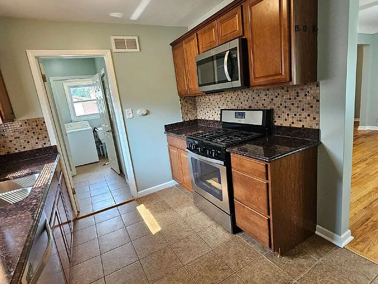8457 McKinley Ave — Photo 6