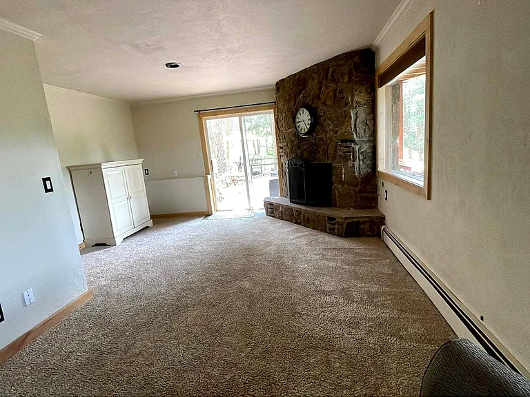 Sliding glass door leading to the patio from the bonus space
