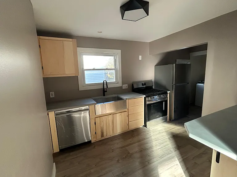 Beautiful concrete countertops. New cabinets and appliances.