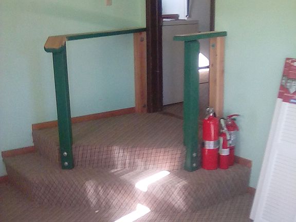 This room is spacious walkway when entering back door.