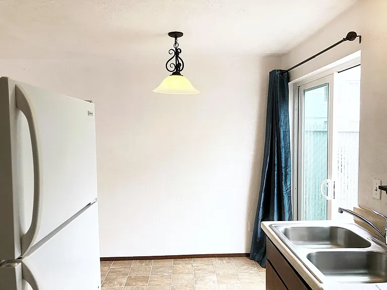 Kitchen looking into dining area