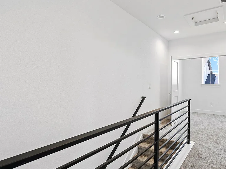 Stairs w/ Upgraded Railing leading to Bonus Room that can be used as Office, Playroom or Library