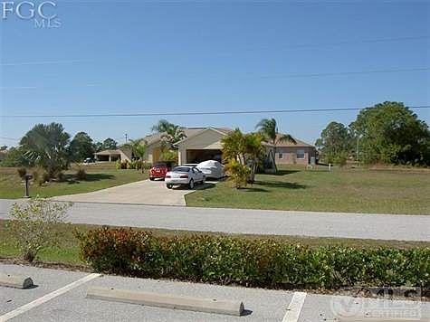 Secluded oversized elevated lot with wide driveway and culvert