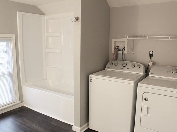 Master Bathroom With Washer and Dryer