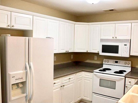 Spacious kitchen with double sink & garbage disposal. Open view, to dining and family room.