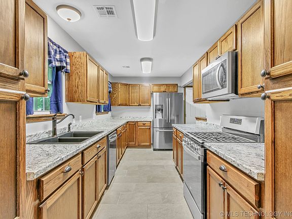 3rd image of 9235 N 163rd East Ave