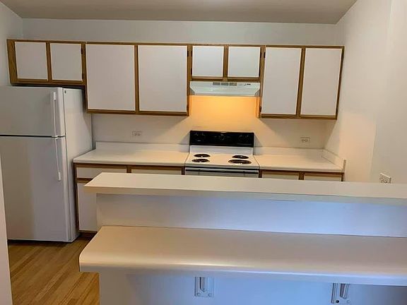 Spacious Open Concept Kitchen with Breakfast Bar