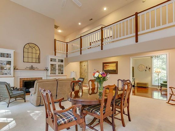 Spacious open concept living space shows off the high ceiling as well 