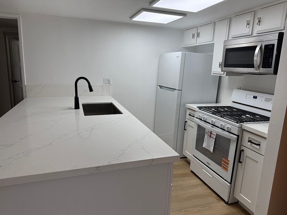 Brand new appliances. Huge island with cabinets on both sides.