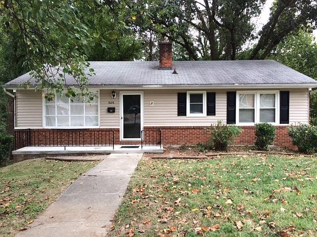 front with newly poured front porch