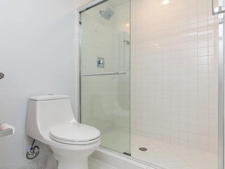 1st Fl bathroom has large shower.