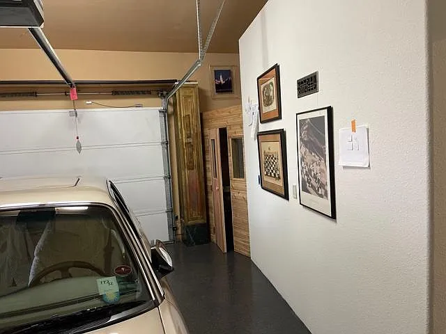 garage has small sauna, storage, 2nd refrigerator & 2nd microwave