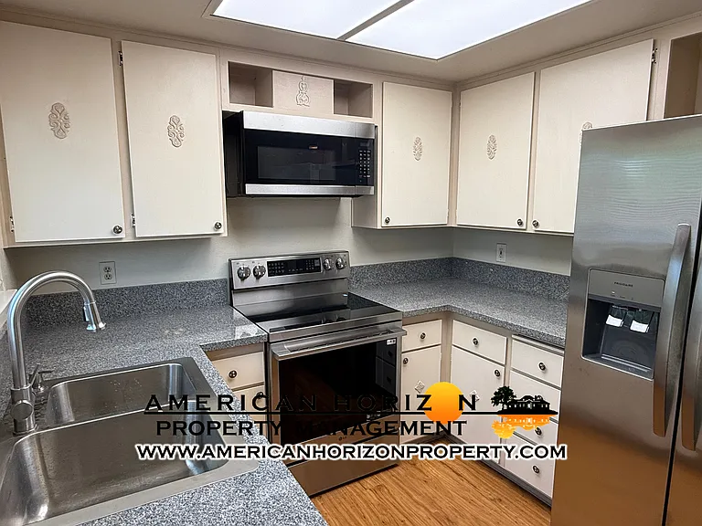 Kitchen with new appliances.