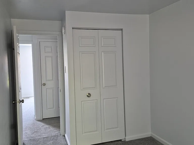 3rd bedroom with closet. Large linen closet in hallway