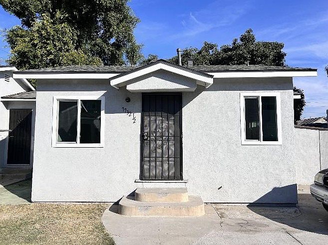 Front of apartment with all brand new windows 360.