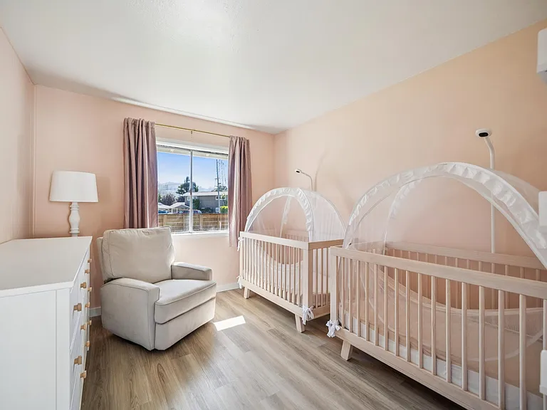 Bedroom currently configured as a nursery. Cribs and children's furnishings can remain upon request