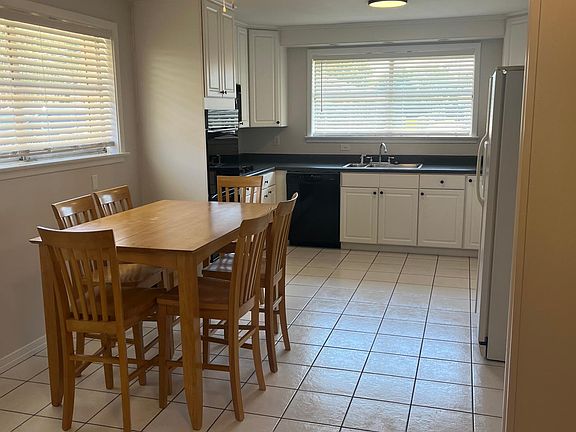 Kitchen and dining area,
Table not included