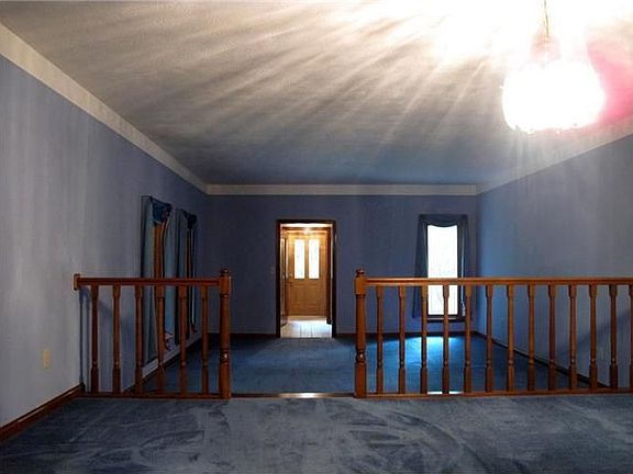 1st Floor Plan: Formal Dining Room overlooks the Great Room & Front Entry.