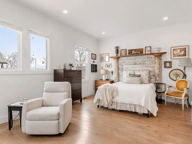First-floor bedroom suite with private exterior entrance, ideal for guests or extended family.