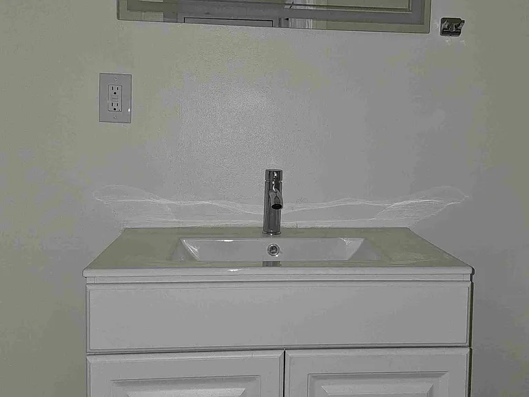 1/2 Bath with New sink and LED Mirror.