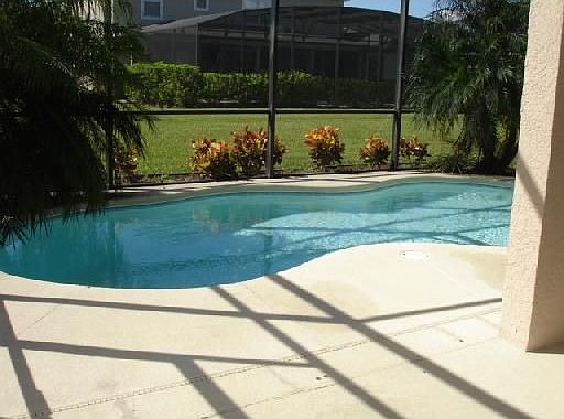 Large covered Lanai overlooking tranquil pool