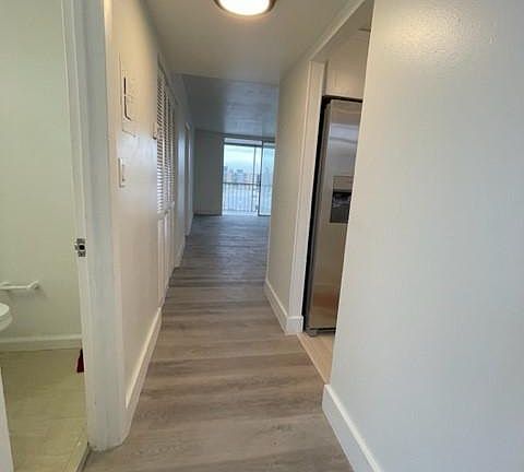 entry with half bath and kitchen