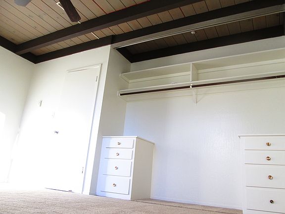 Massive full length closets with top shelf!