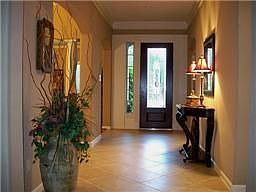 Enter through the lead glass door into the foyer and you'll know immediately that you've found an im