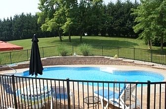 Pool w/ iron fencing