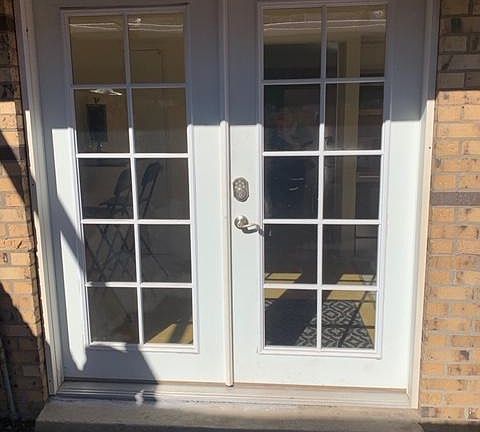 Back door with programmable punch button entry.