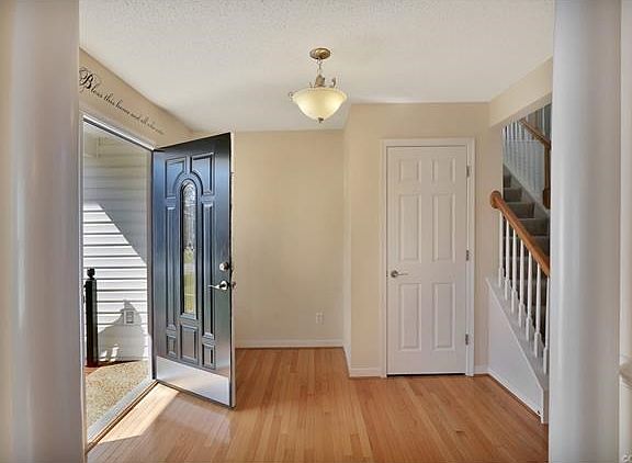 Foyer with hardwood floors